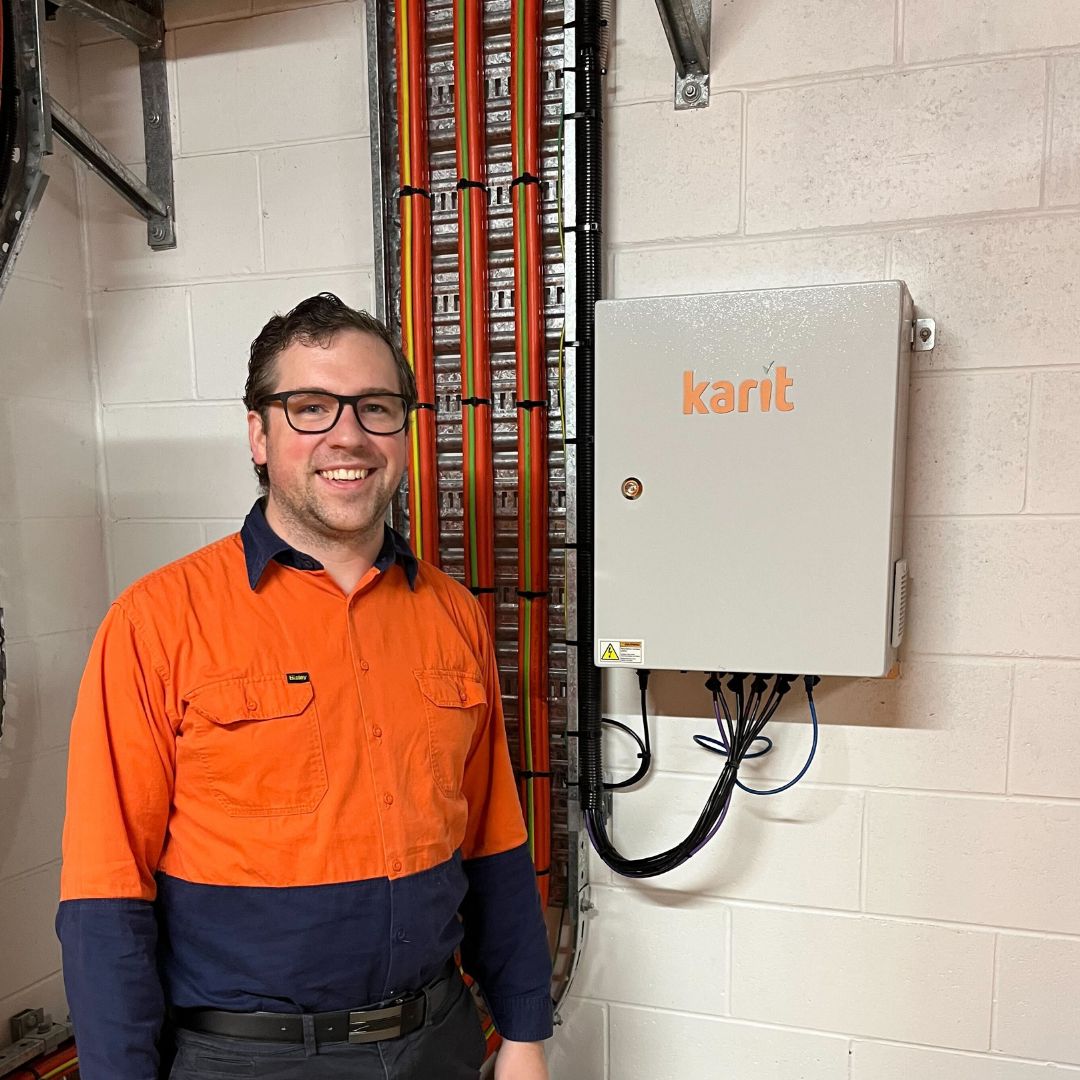 Oliver inspecting Karit multibox. Karit energy management hardware insitu at customer premises.